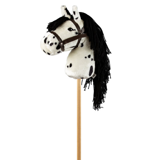 Steckenpferd weiß mit schwarzen Punkten