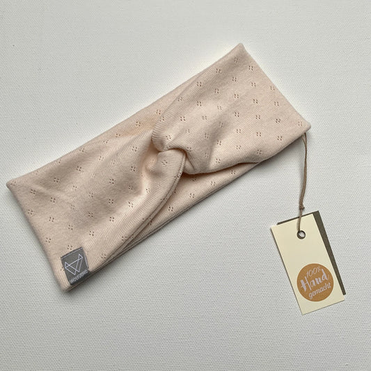 Twist Stirnband Creme Lochmuster